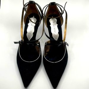 Nine West black pointed toe heels.